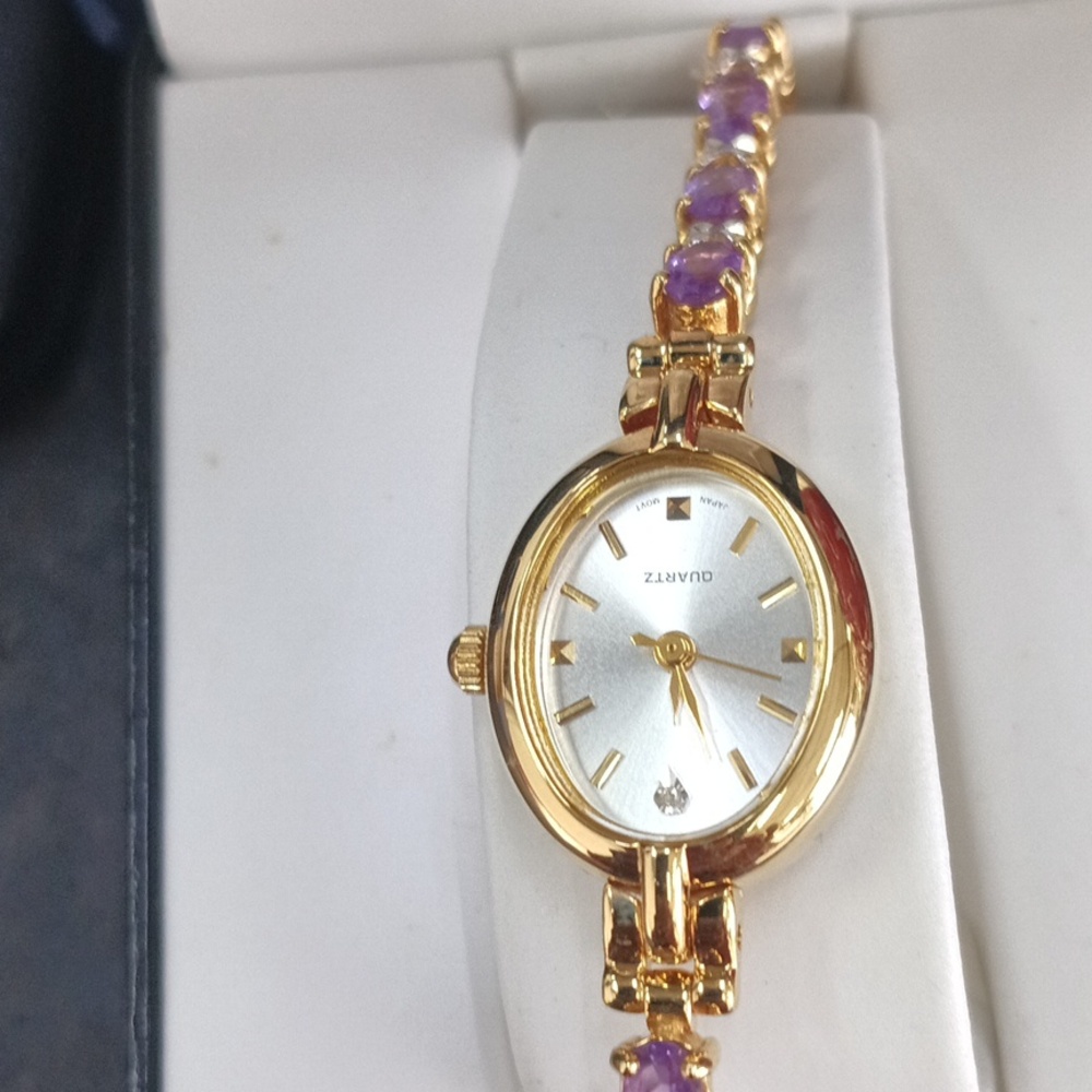 Diamond Accent Amethyst Bracelet Watch. 8 1/4 Inches Long.